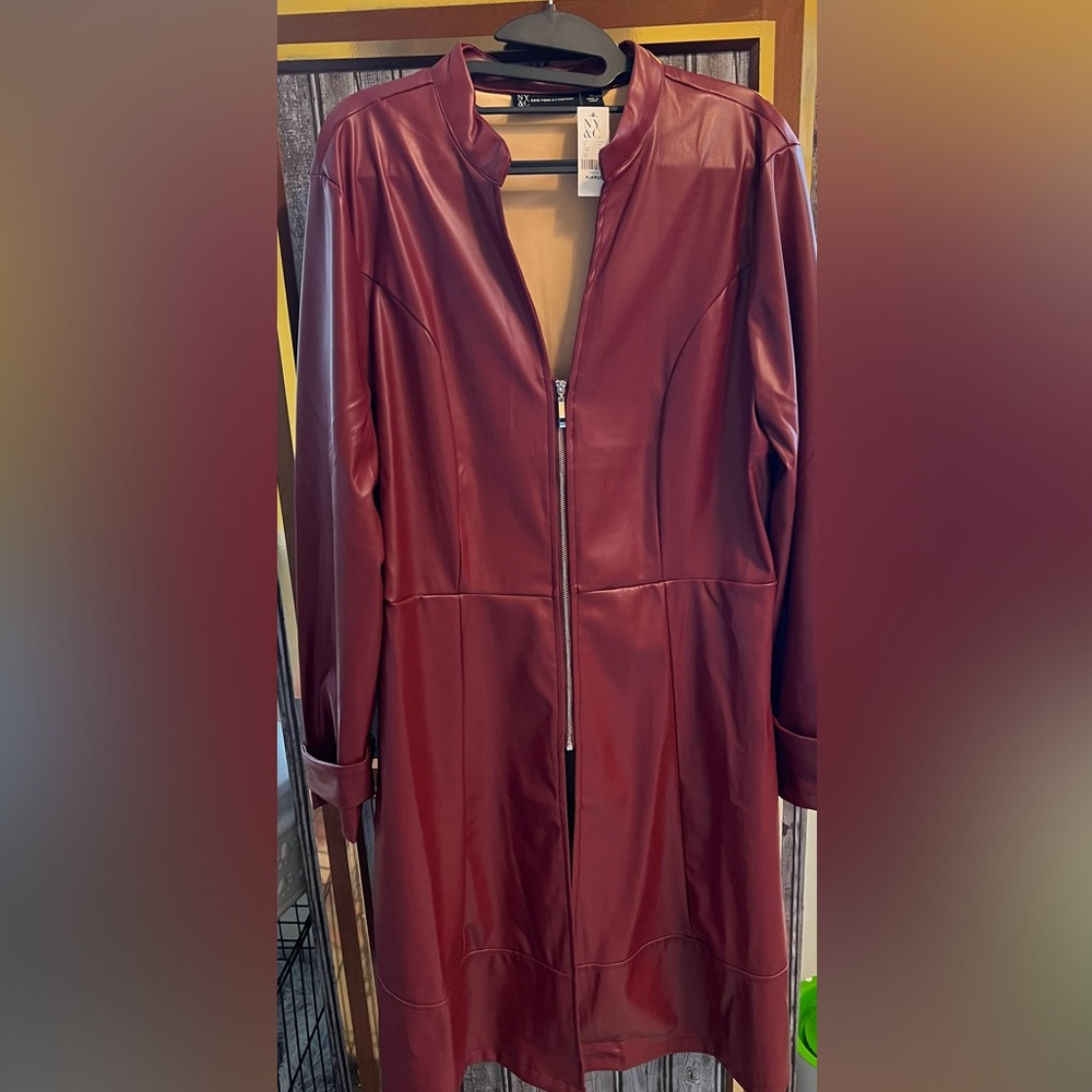 NWT long Faux leather jacket with zipper.